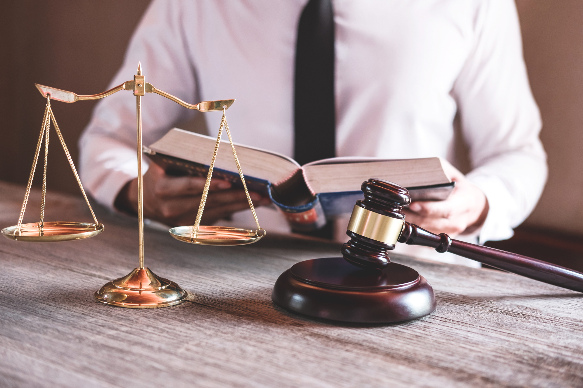 Legal scales and gavel representing Saba Ahmed legal services